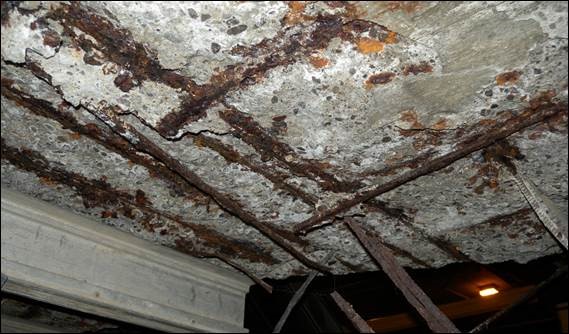 A close-up of a concrete ceiling
Description automatically generated